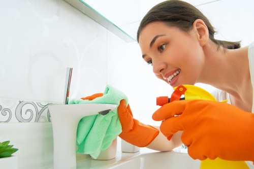 Professional cleaner in TW10 servicing a tidy home