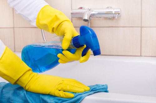 Deep cleaning a sofa in a TW10 living room