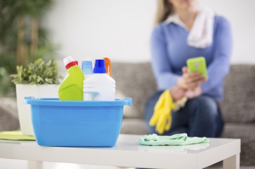 Preparing a living room for upholstery cleaning service in TW10